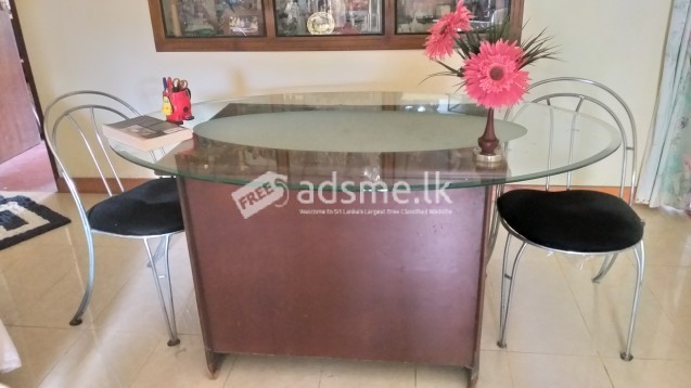 Wooden and glass top tables