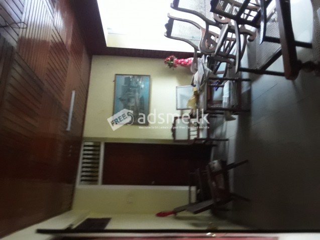 A land with twin houses and a clinic for sale in Colombo