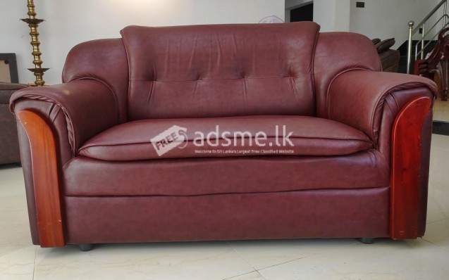Sofa with glass coffee table