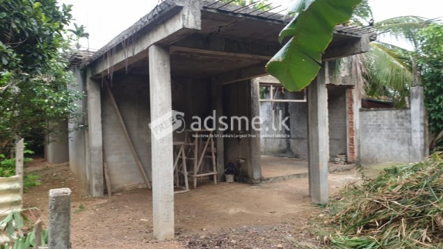 Land with half constructed  two storied house for sale