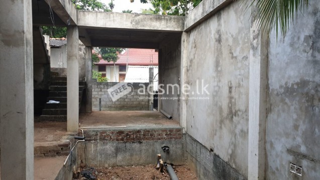 Land with half constructed  two storied house for sale
