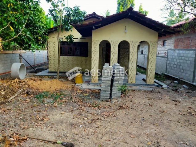 Land for sale with house