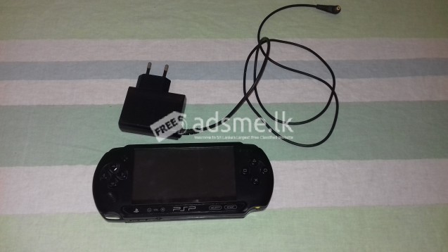 Original SONY PSP E1004 with original power pack.