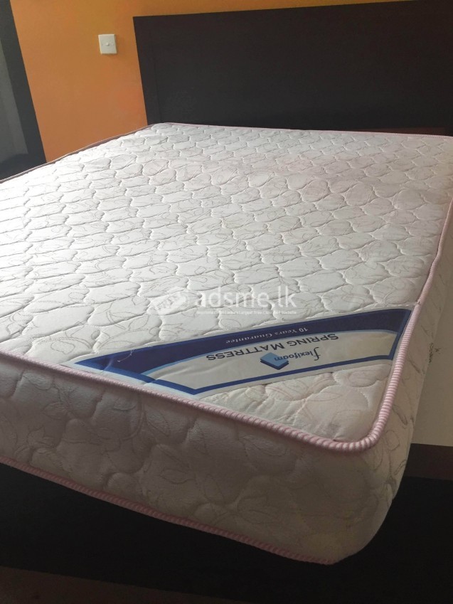 Teak bed with spring mattres