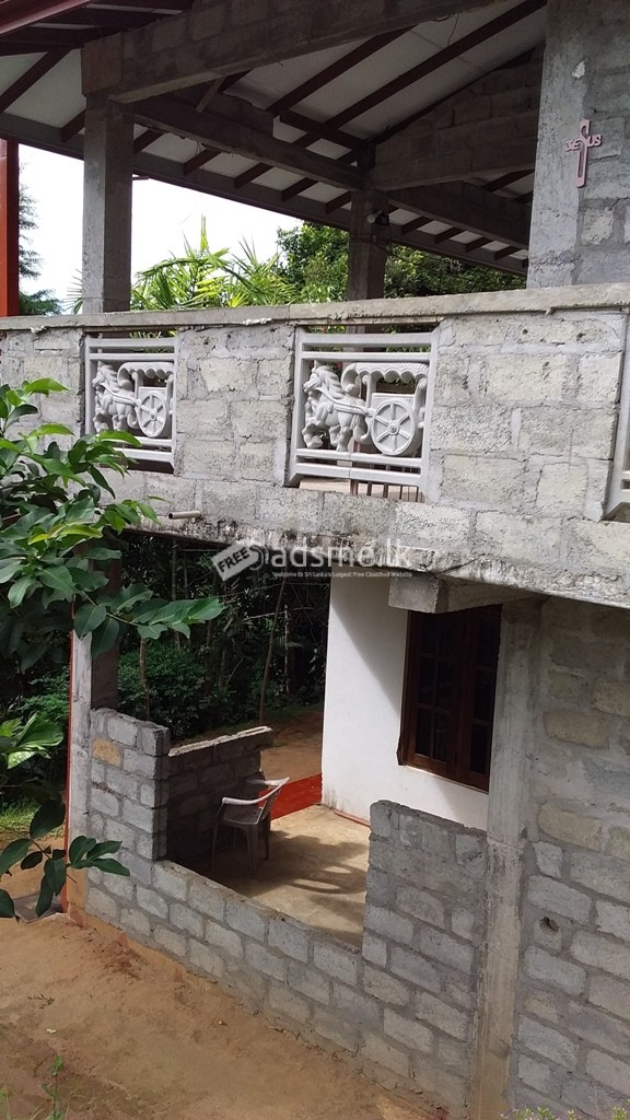 land with two story house for sale