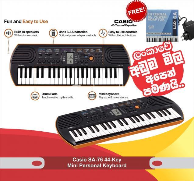 Casio Mini Portable Keyboard - SA-76  With Power Adaptor Casio LAD 6 Adaptor  (9.5 V)
