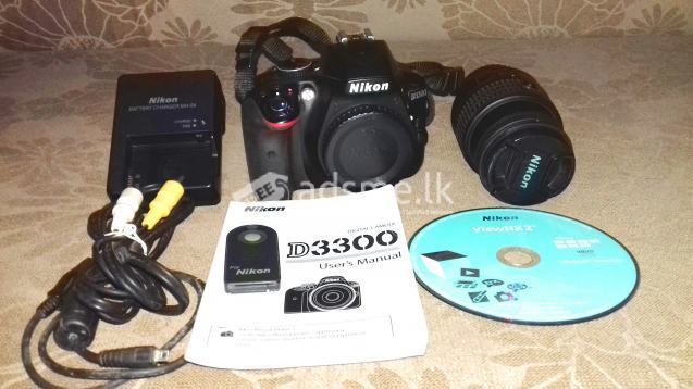 D3300 with 18-55mm kit lens + 55-300mm zoom lens and accessories