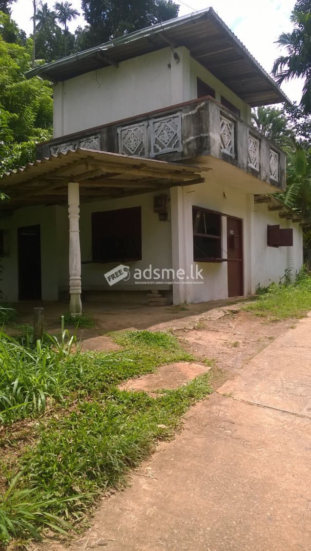 Land with house and shop around Kandy