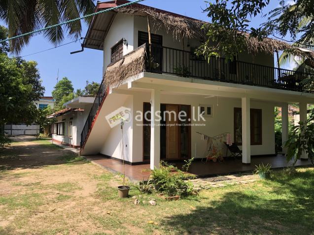 50 perch land with a tourist guest house for sale in tangalle beach area