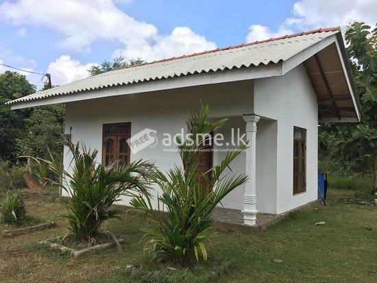 Land with a new small house for sale