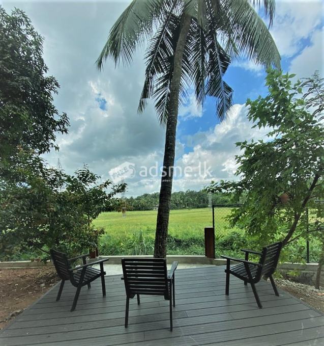A beautiful 2 story house surrounded by a beautiful paddy field is for rent.