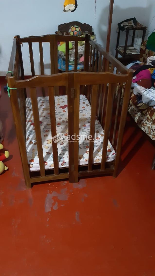 Wooden baby cot