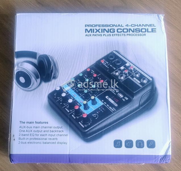 Professional 4-Channel Mixing Console Aux Paths Plus Effects Processor .