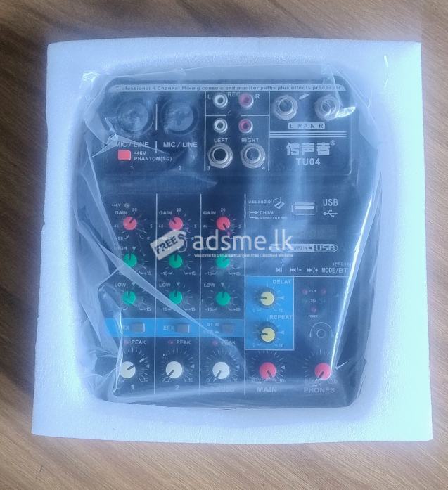 Professional 4-Channel Mixing Console Aux Paths Plus Effects Processor .