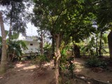 Land with house for sale in Makola