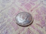 1943 coin with King George VI's Mark