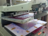 Uv varnish machine and automatic screen printing machine.