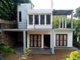 A two-story house is available for sale in Kandy area.