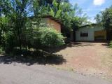 Land with house for immediate sale